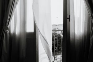 Why Your Bedroom Air Feels Heavy Near Curtains